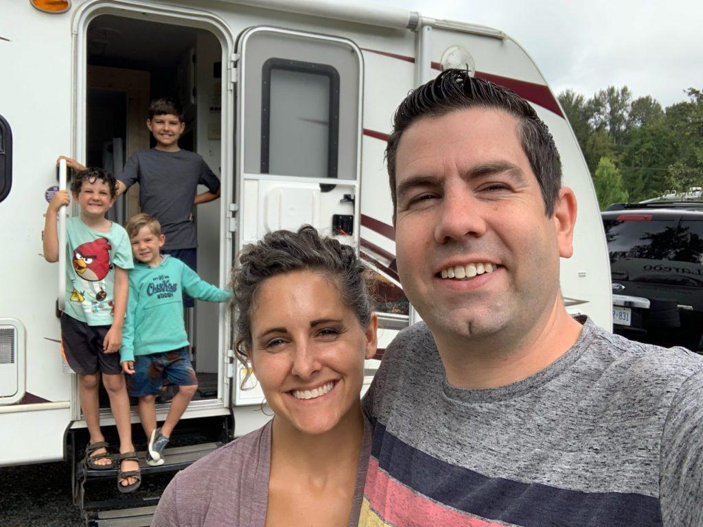 Our family outside of our travel trailer