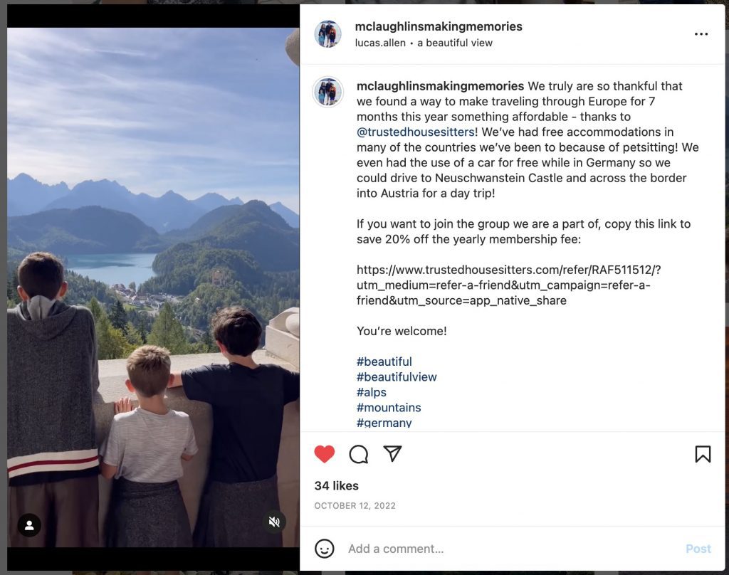 Looking over the Neushcwanstein Castle balcony with kids