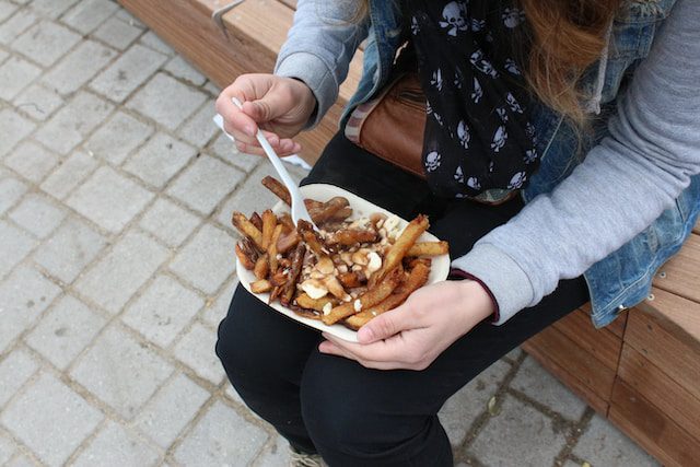 try poutine in vacation in Quebec