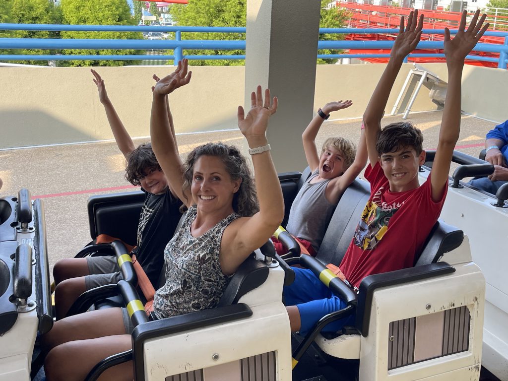 Riding a roller coaster as a family