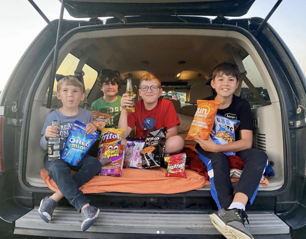 At the drive in with road trip snacks