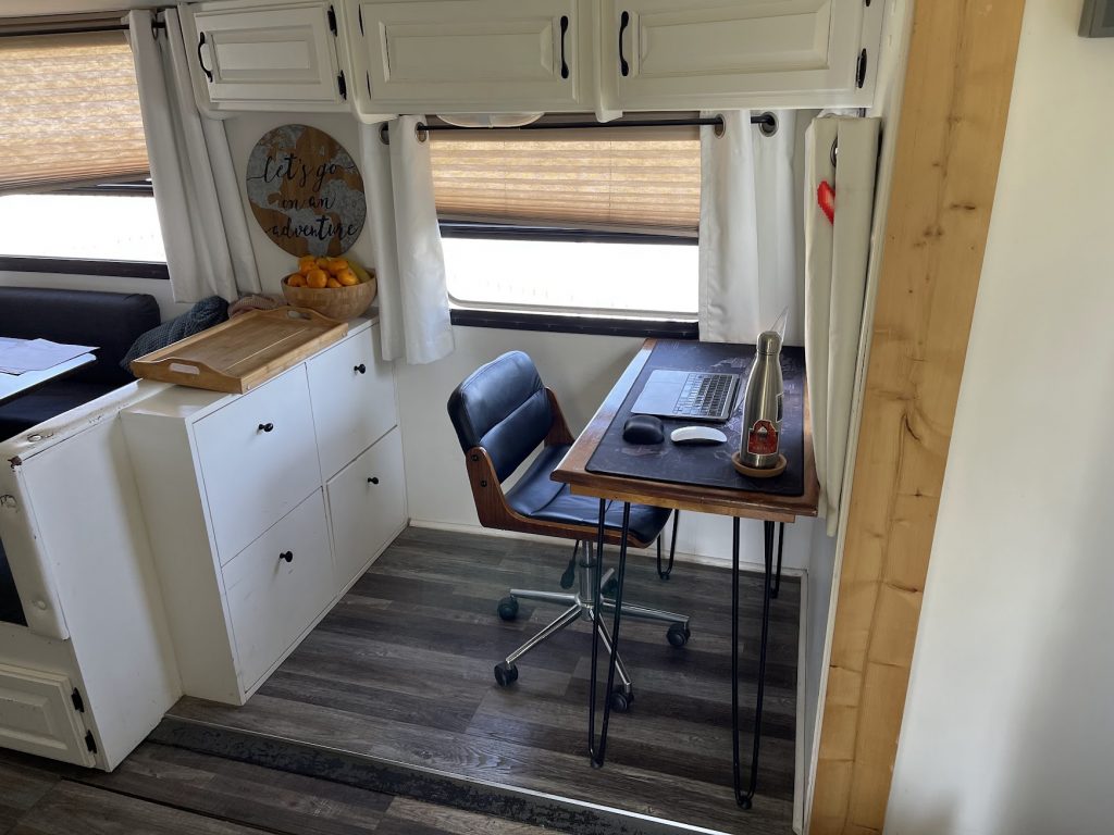 An office space in our RV slideout where we removed the loveseat