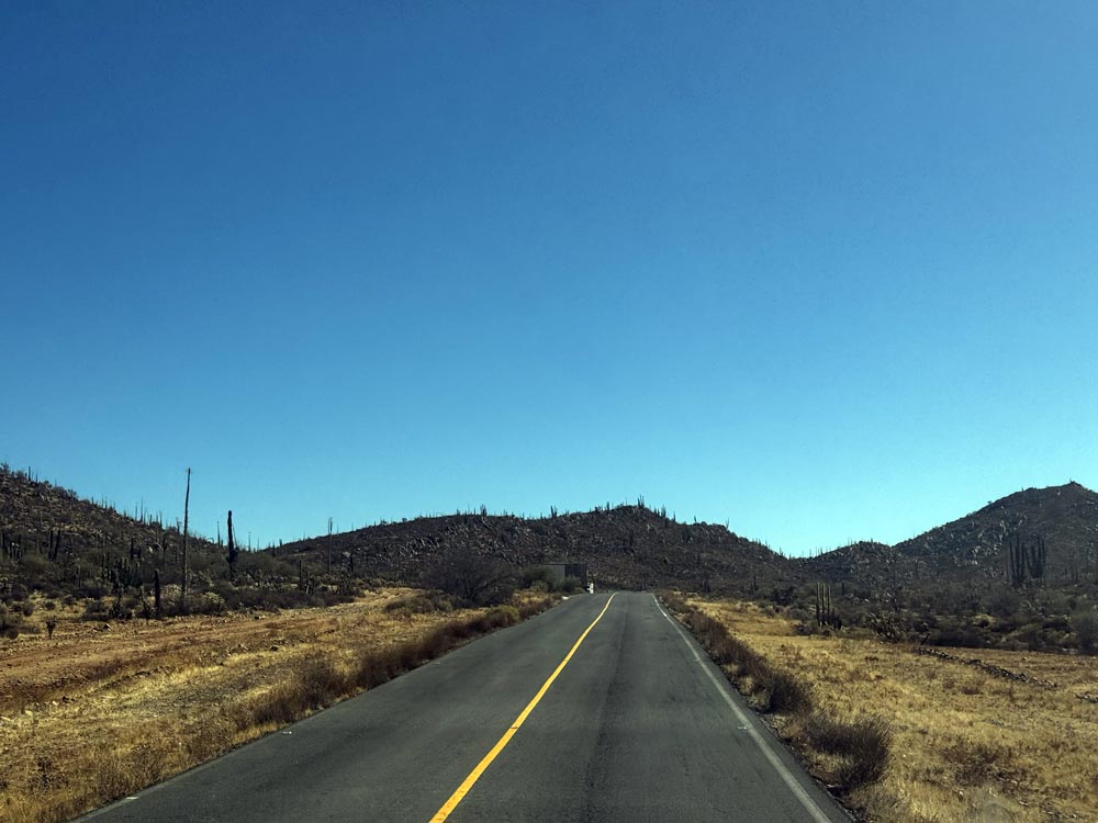 A baja highway with very little shoulder