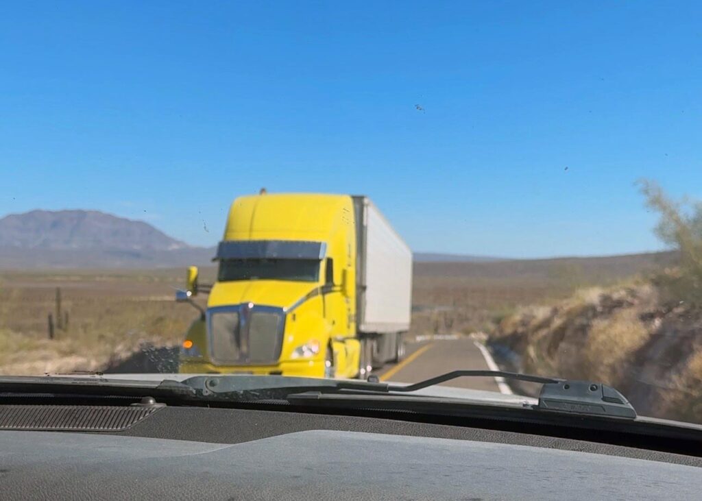 Highways are tight including this VERY close transport truck