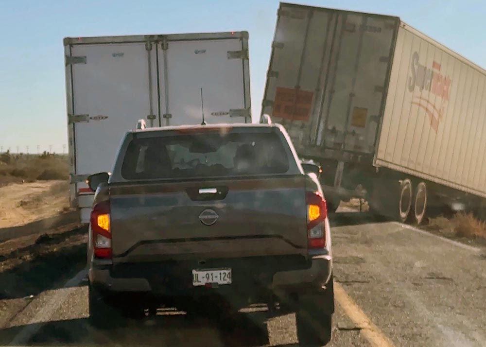 Highway in Baja being blocked by transport truck