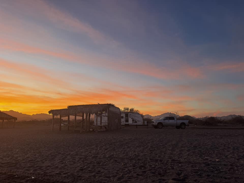 Sunsets at palapas while camping at the beach near Loreto