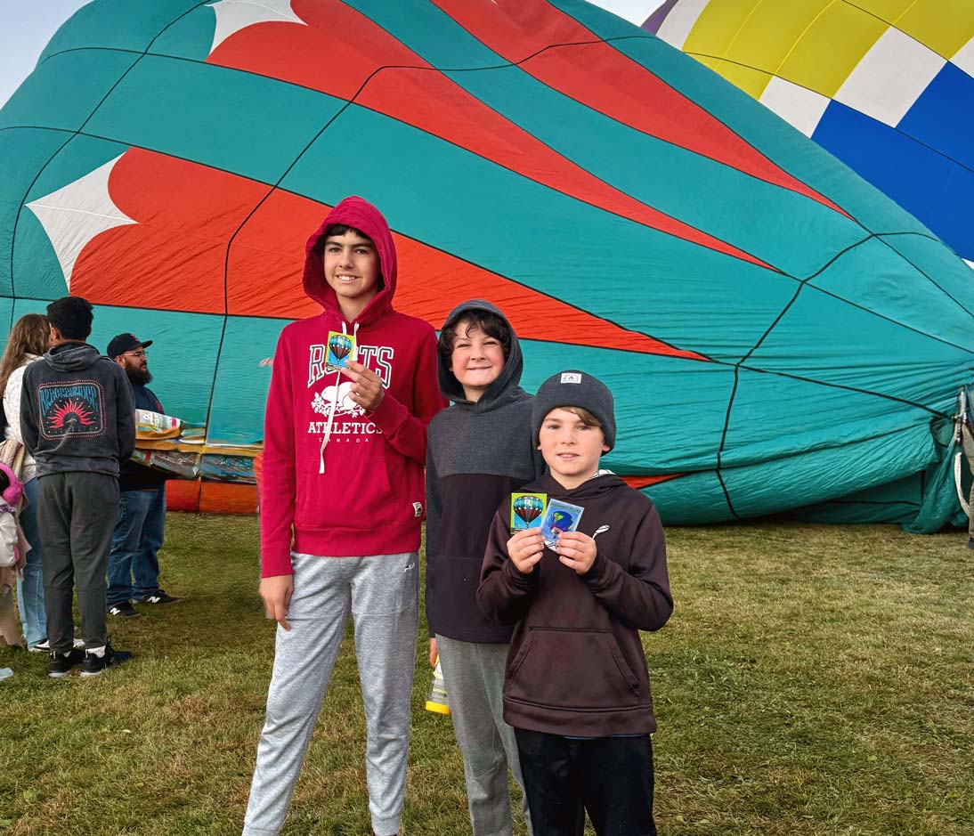 collecting trading cards at the Albuquerque Balloon fiesta