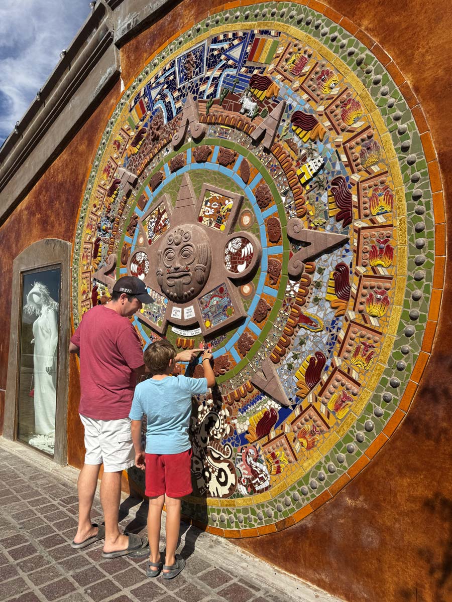 Sculpted artwork on the side of a building in Todos Santos