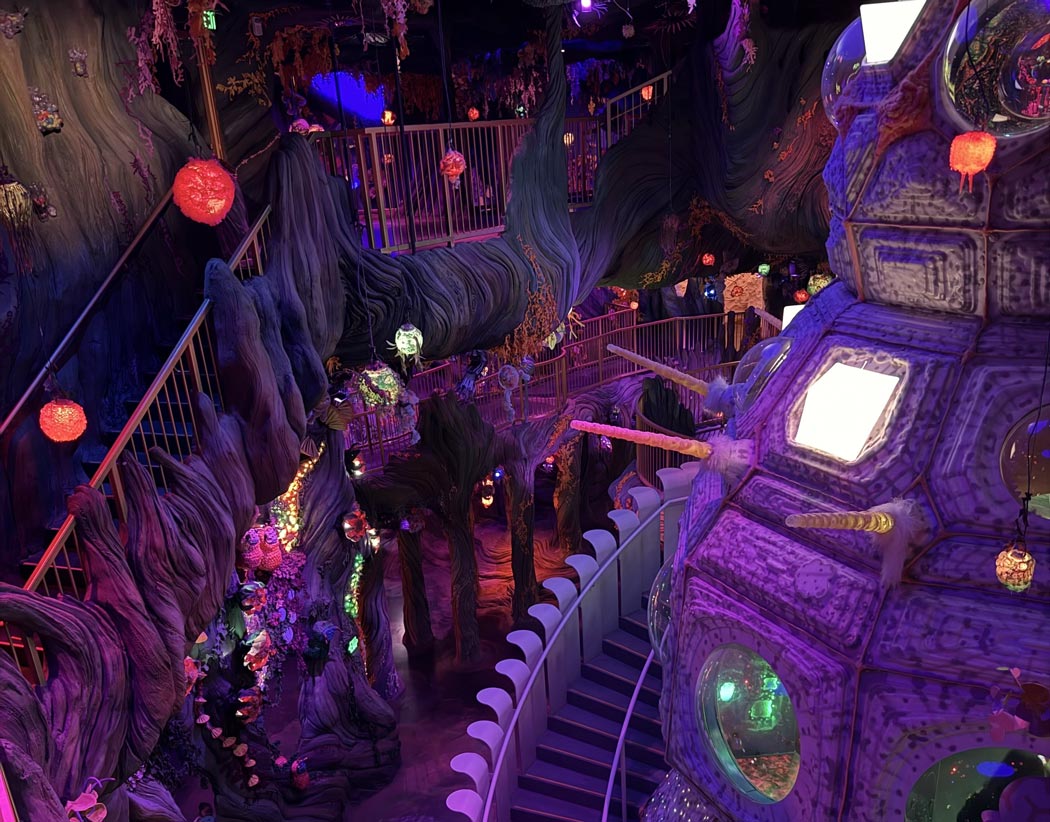 A multi-floor exhibit at Meow Wolf, Denver