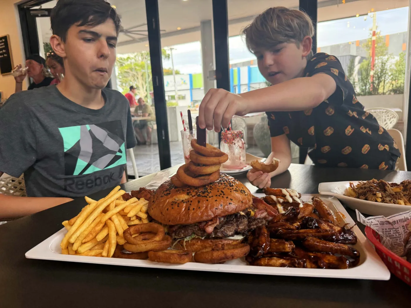 Inspecting the Burgzilla platter at Burgery Bar, Wanneroo