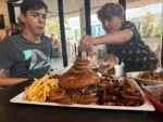 Inspecting the Burgzilla platter at Burgery Bar, Wanneroo