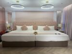 Two queen beds are the standard for the Diva Suite at the Granite in Penang